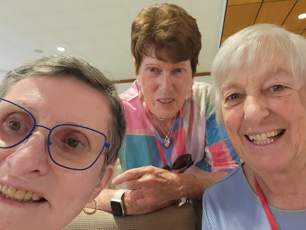 Sister Celeste Reinhart takes a selfie of herself, Donna MacKay (middle), and Sister Barbara Paleczny