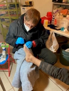 Sister Lucy Nigh doing footcare