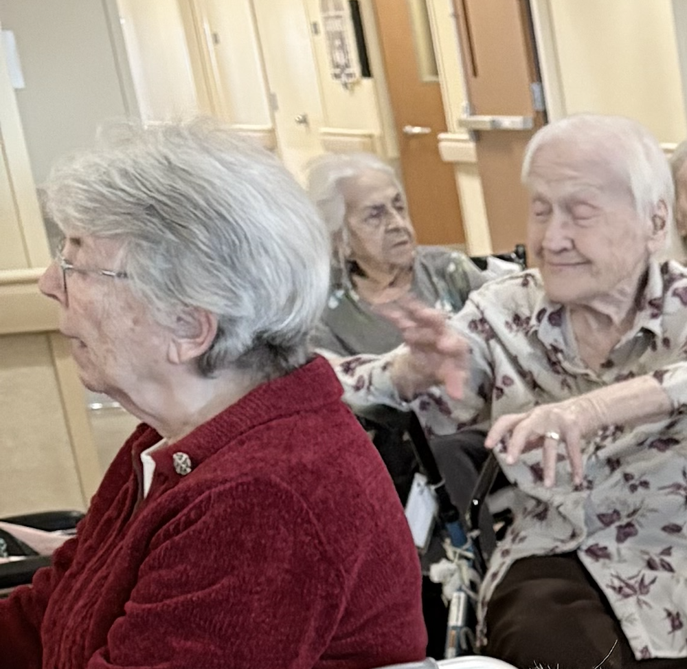 Sisters singing at Christmas