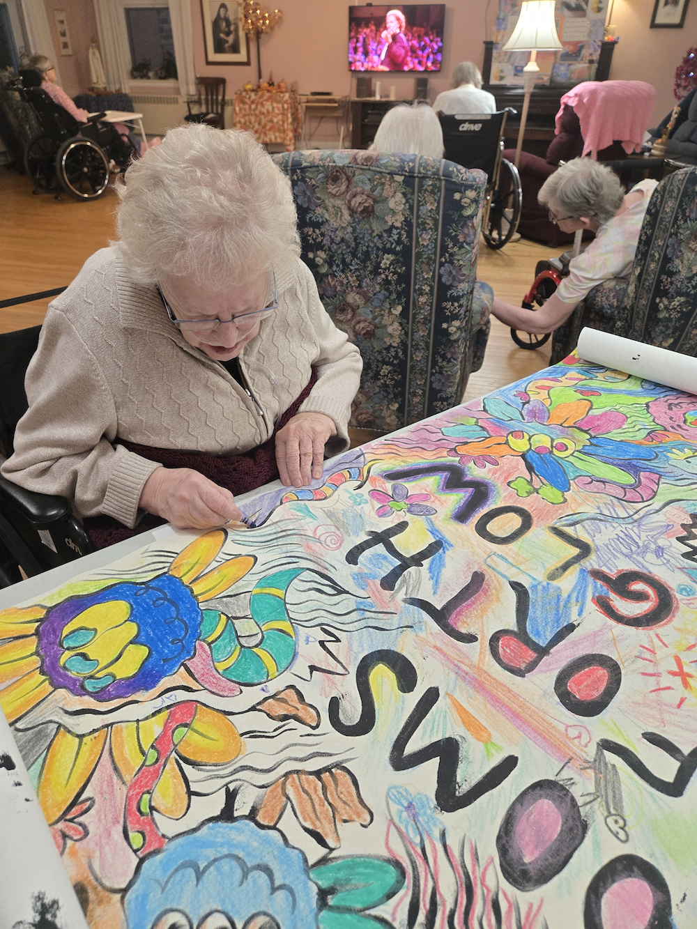 Sister Colette Ryan Works on Colouring Sheet