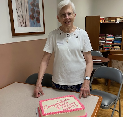Photo of Sister Shirley with birthday cake