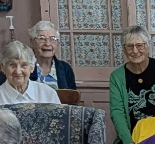 photo of Associate Christine with two Sisters