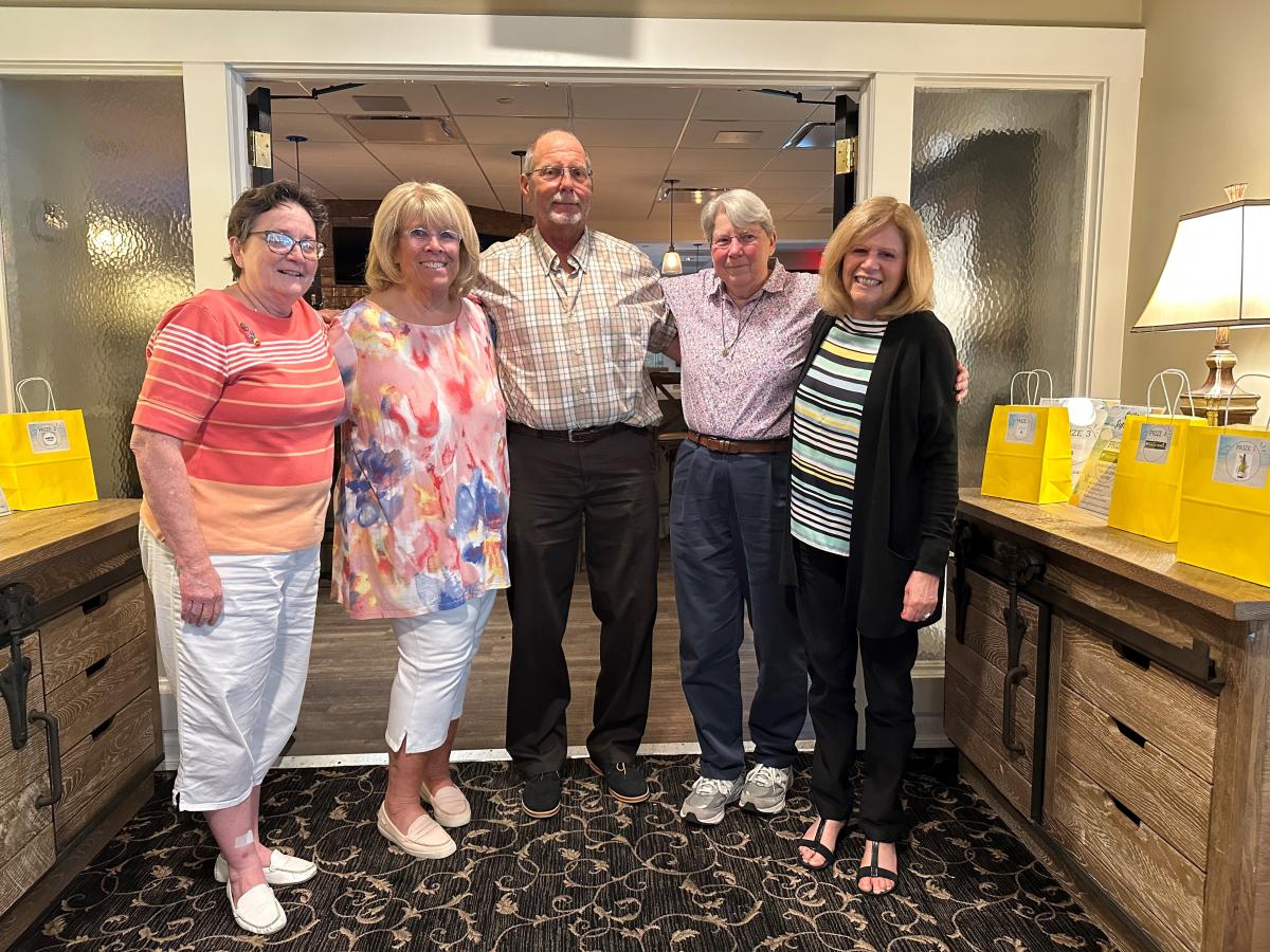 Sister Mary Foley, second from right, has retired as Academy of Holy Angels social worker, but will stay on as director of operations in the new auditorium. SSND Associate Kathleen Sylvester, left, has also retired.