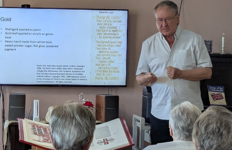 Docent Brian Craig presents the Saint John's Bible to Sisters at Waterdown