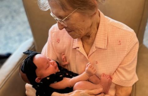 Sister Jeanne McGue holds Noona