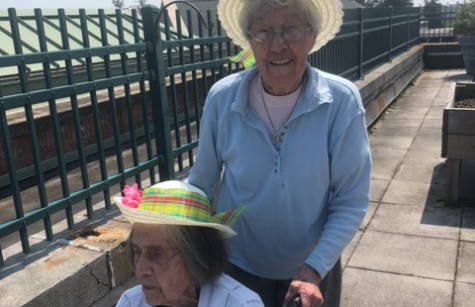 Sisters Kay Lehner (standing) and Kathleen Engers pose for the camera!